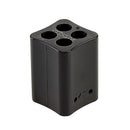 Black GlueSaver hot melt glue saver block with four holes designed to reduce waste and maximize adhesive use.