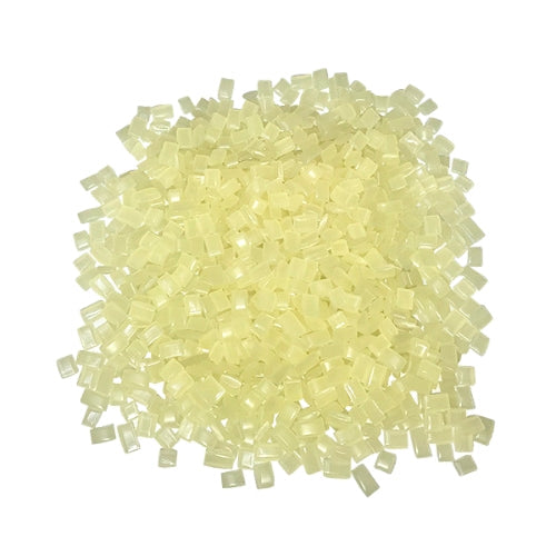 Pile of Pale Amber TEC Bond 214B Hot Melt Pellets