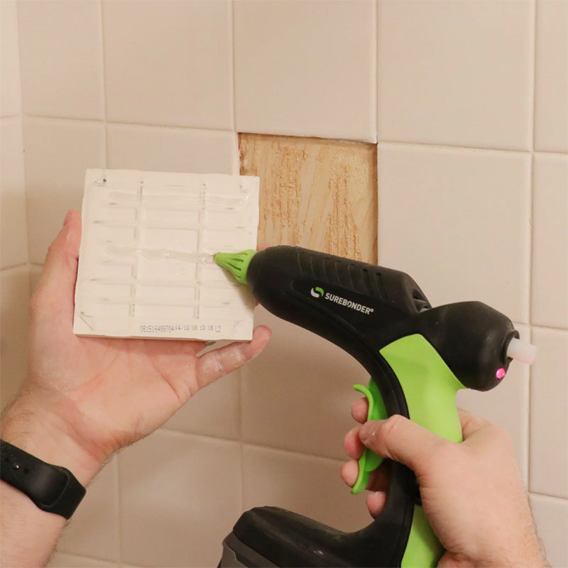 Surebonder Pro2-60 Battery Glue Gun used to glue tile.